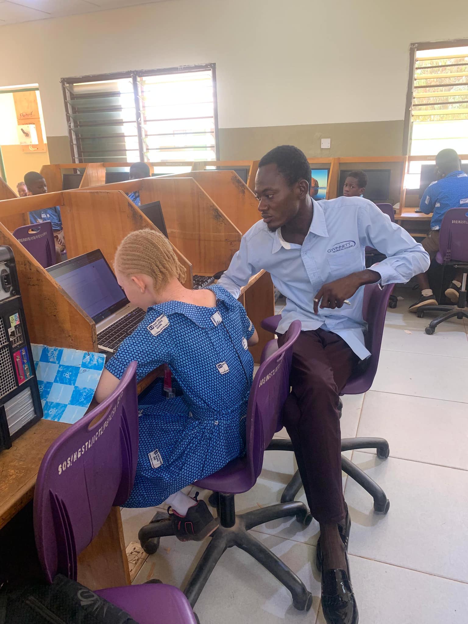 Youth participating in a technology session